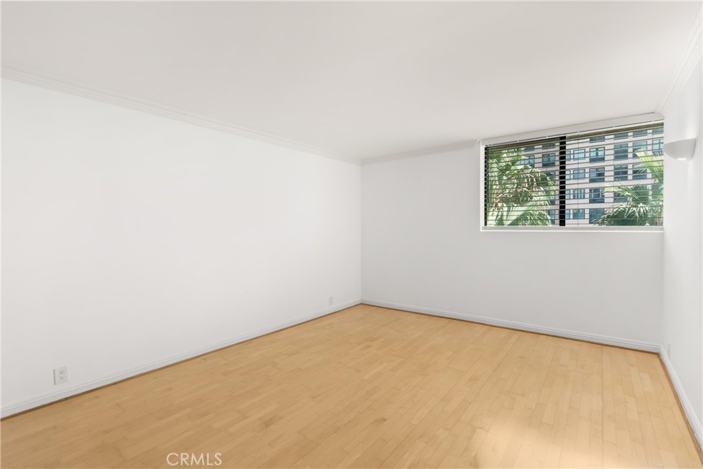 10535 Wilshire Boulevard, Unit 912 Los Angeles, CA 90024 - Photo 24 of 33 an empty room with a window