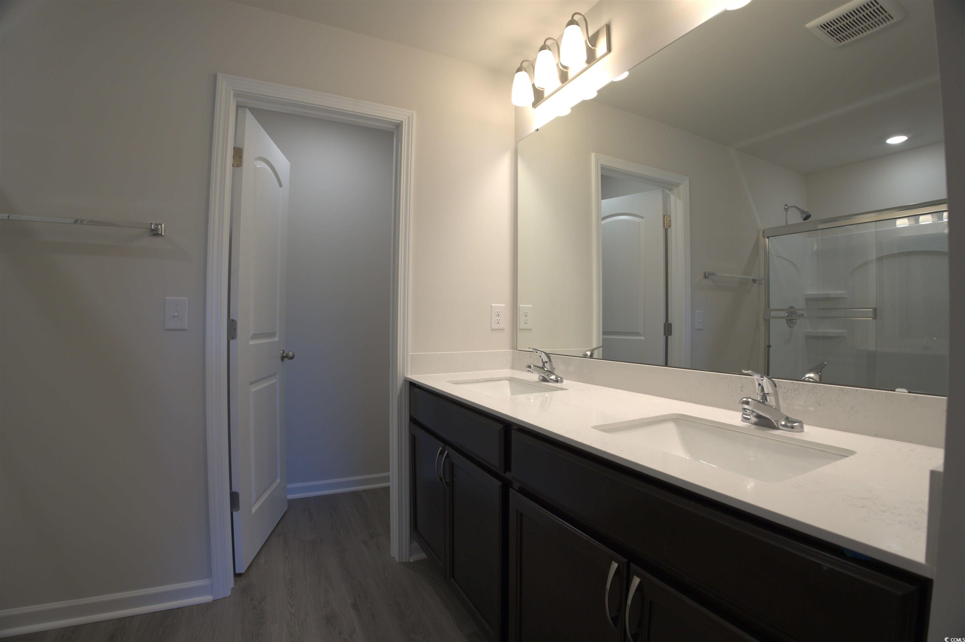217 Kc Lane Aynor, SC 29511 - Photo 9 of 14 Bathroom featuring vanity and shower / washtub combination