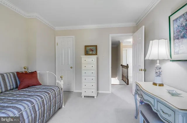 a bedroom with a bed and a cabinets