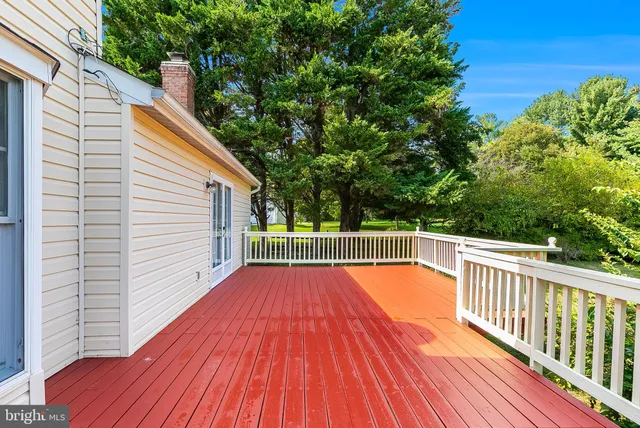 a view of balcony with a deck
