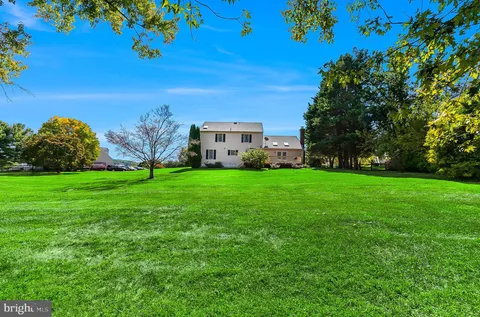 a view of a house with a big yard