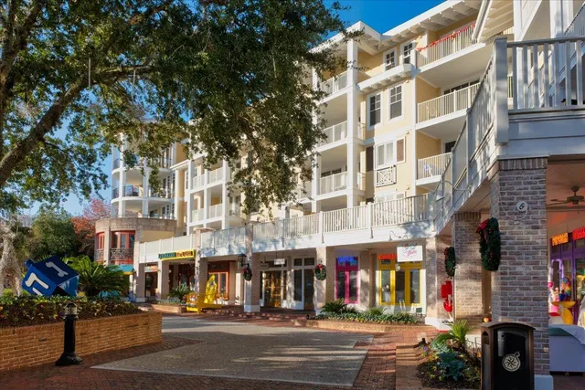 a view of a brick house with a lake view