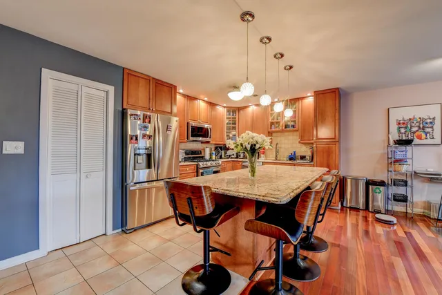 a bathroom with a sink toilet and mirror