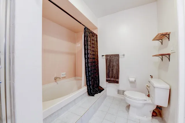 a bathroom with a bathtub