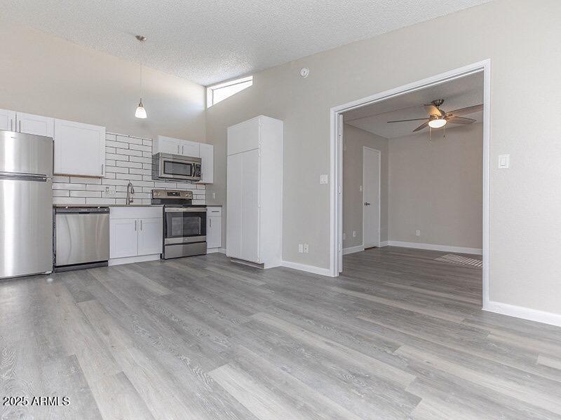 13517 West Glendale Avenue, Unit 1 Glendale, AZ 85307 - Photo 2 of 21 Living/Kitchen