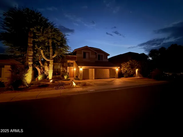 a view of a street with houses on both side