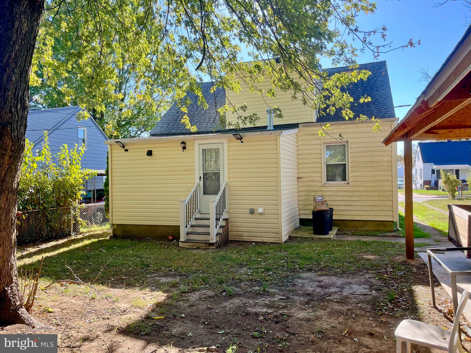 13 Plateau Road Essex, MD 21221 - Photo 3 of 9 a view of a back yard of the house