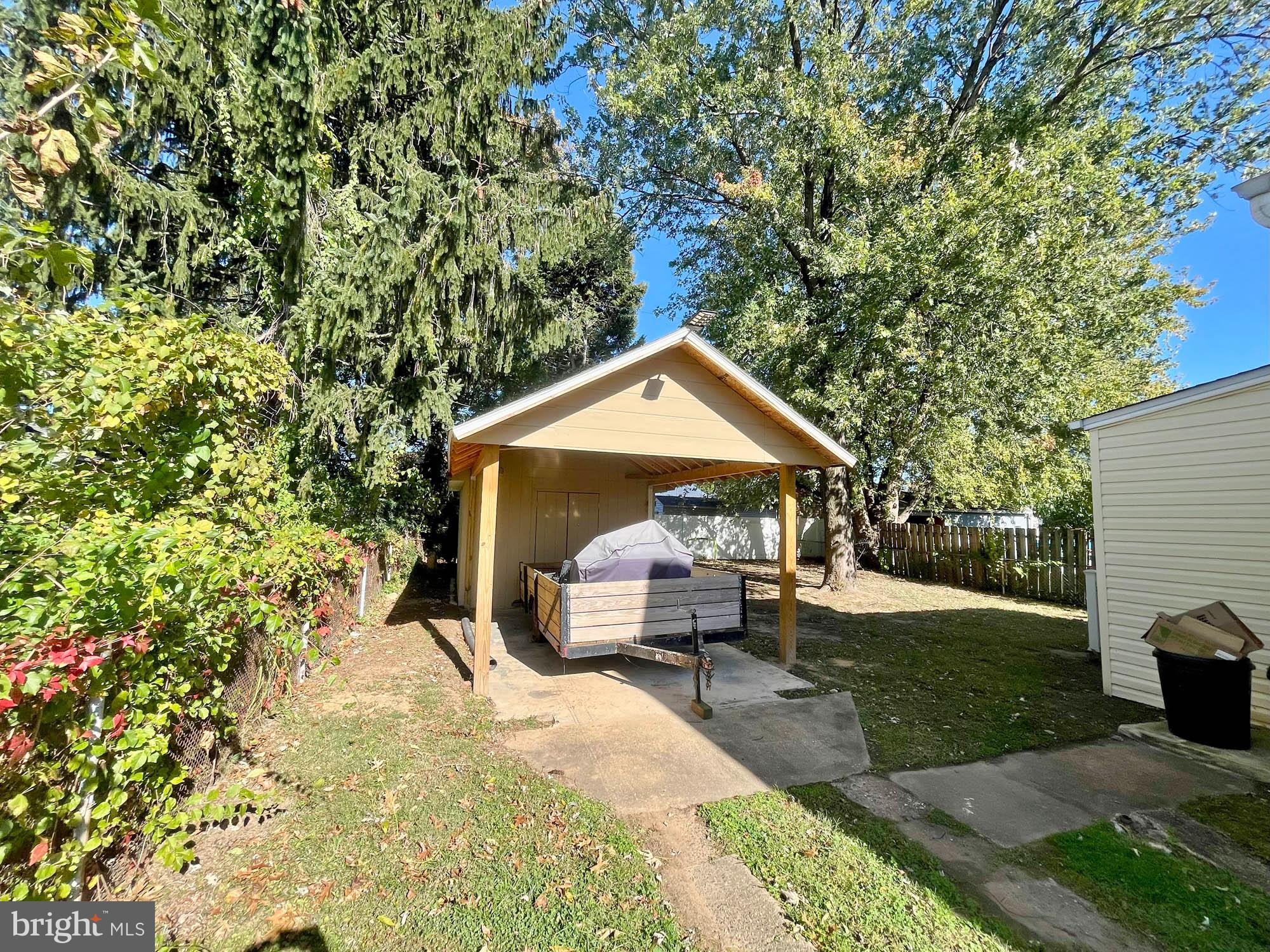 13 Plateau Road Essex, MD 21221 - Photo 5 of 9 a view of a house with backyard and sitting area
