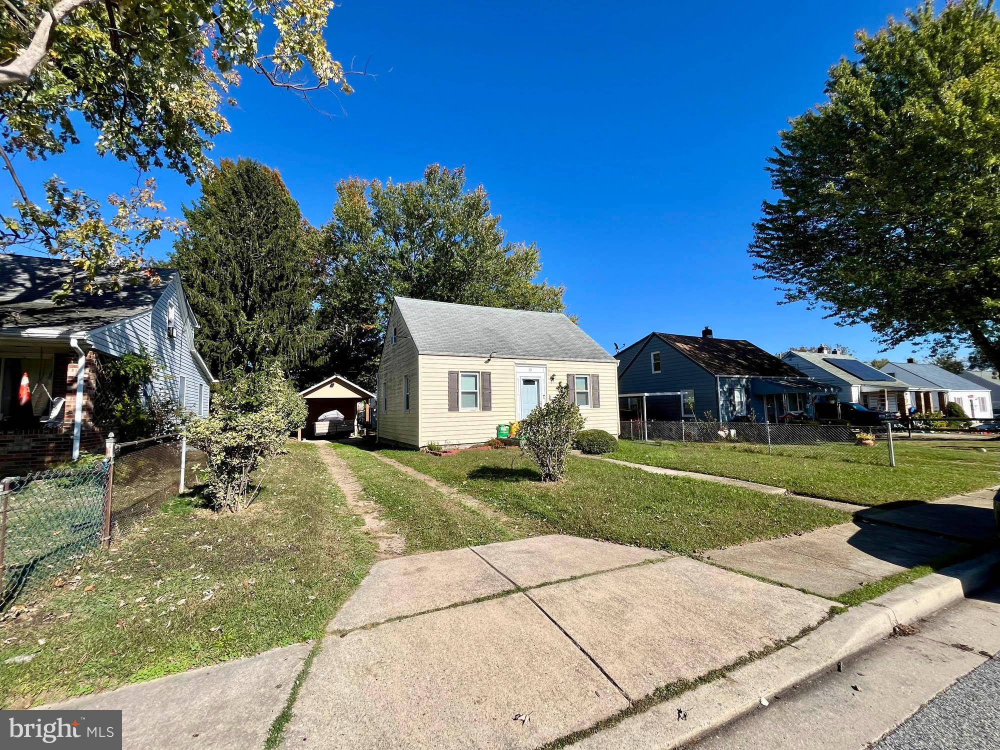 13 Plateau Road Essex, MD 21221 - Photo 6 of 9 a view of a house with a yard