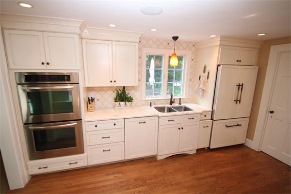 4 Mohawk Road Marblehead, MA 01945 - Photo 3 of 16 a kitchen with white cabinets and white appliances