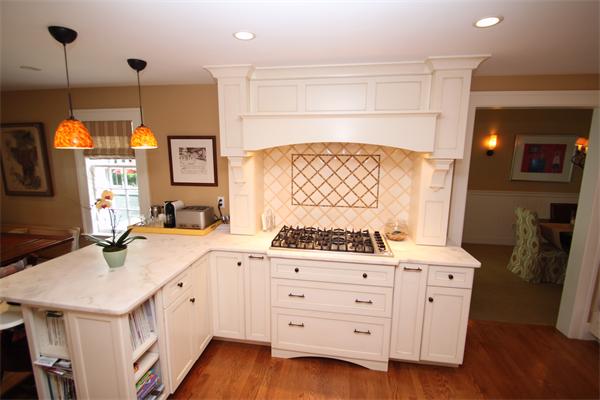 4 Mohawk Road Marblehead, MA 01945 - Photo 4 of 16 a kitchen with a sink stove and cabinets