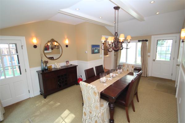 4 Mohawk Road Marblehead, MA 01945 - Photo 7 of 16 a view of a dining room with furniture and chandelier
