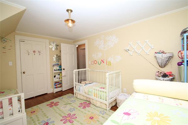 4 Mohawk Road Marblehead, MA 01945 - Photo 10 of 16 a bedroom with a bed and a dresser