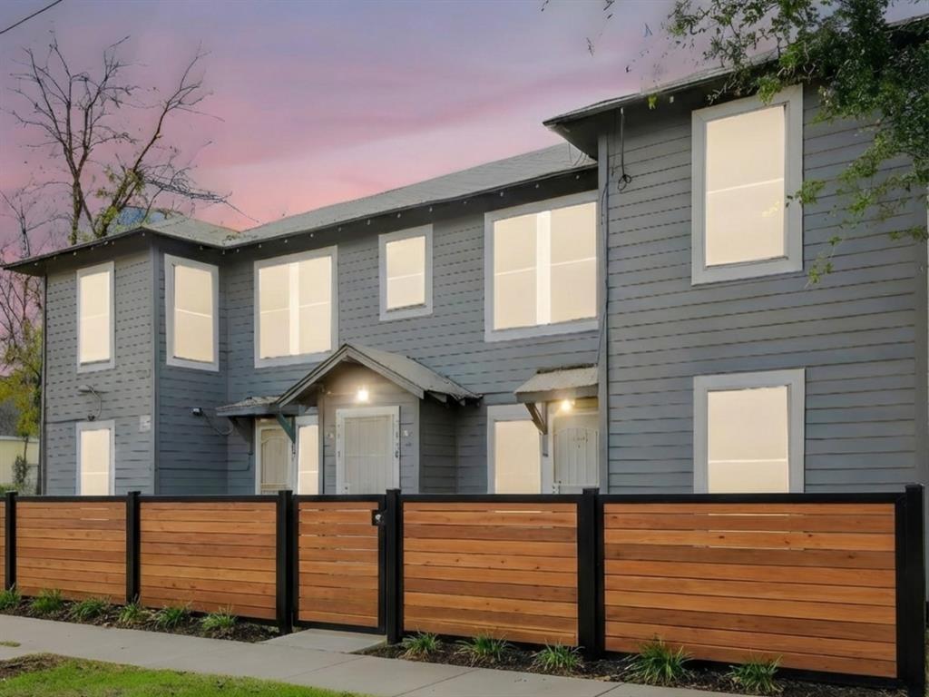 a front view of a house with stairs