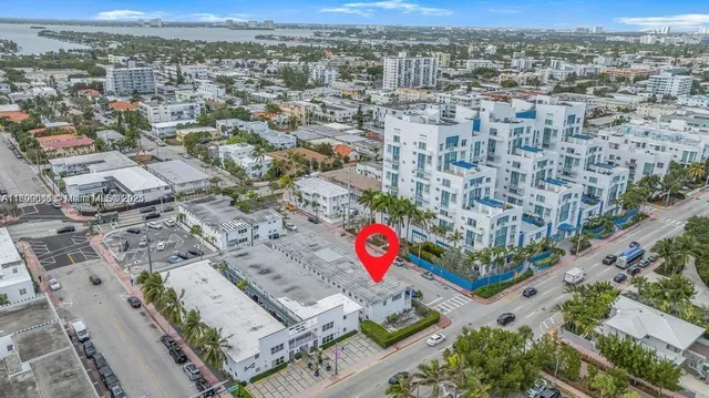 an aerial view of residential house with an outdoor space