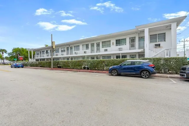 a car parked in front of a building