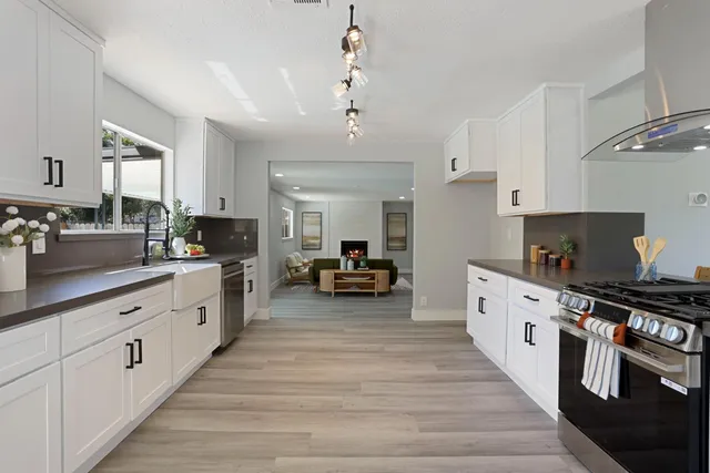 a dining room with furniture and window