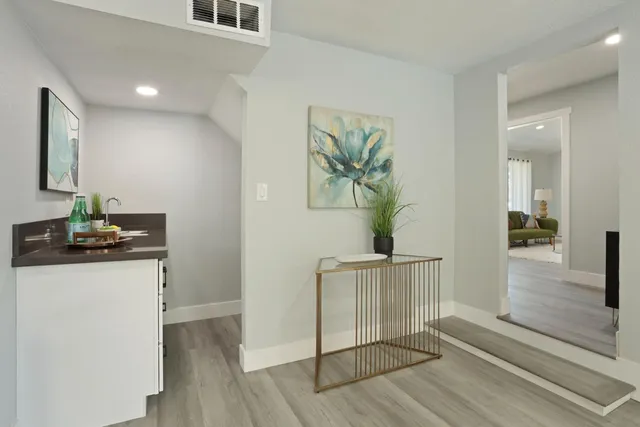 a bedroom with a bed and a couch