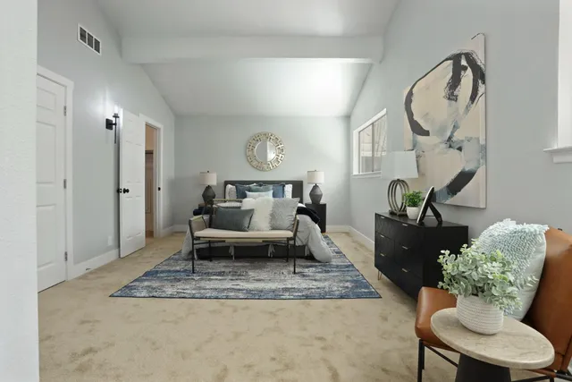 a bathroom with a sink vanity and mirror
