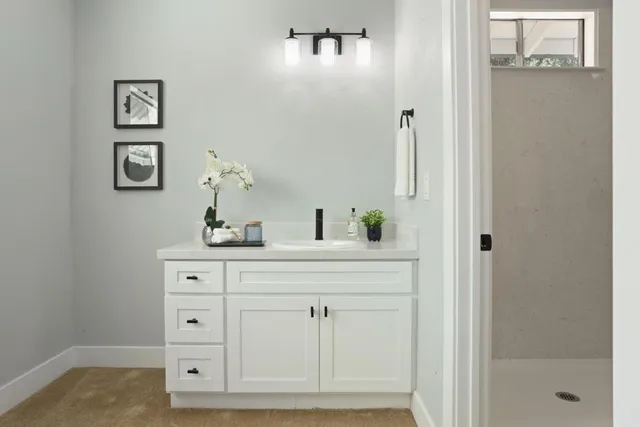 a view of a backyard with a bench