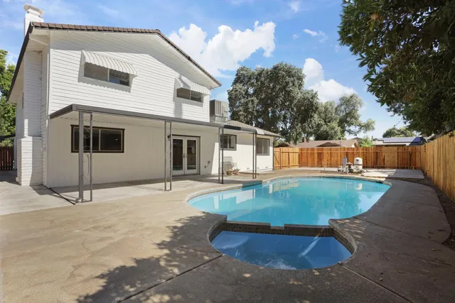 an aerial view of a city with lots of residential buildings