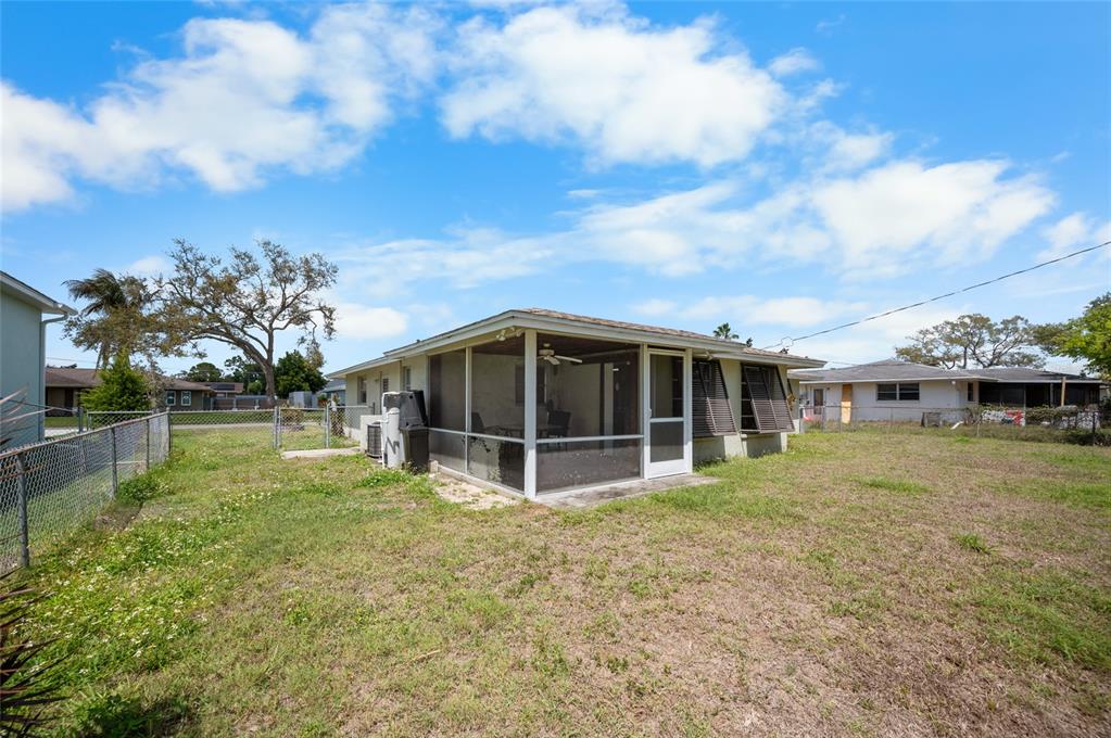 901 Ponderosa Road Venice, FL 34293 - Photo 25 of 33 a view of a house with a yard