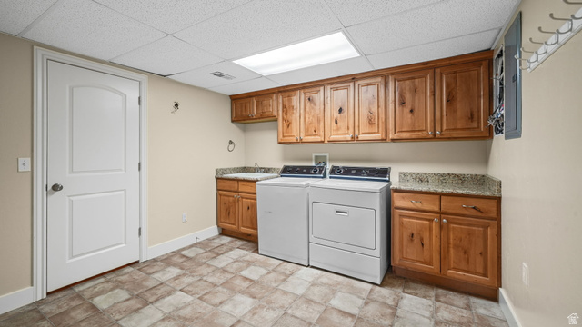 45 North 970 W Street Orem, UT 84057 - Photo 29 of 45 Laundry room with stone finish floors, cabinet space, washer and dryer, and a drop ceiling