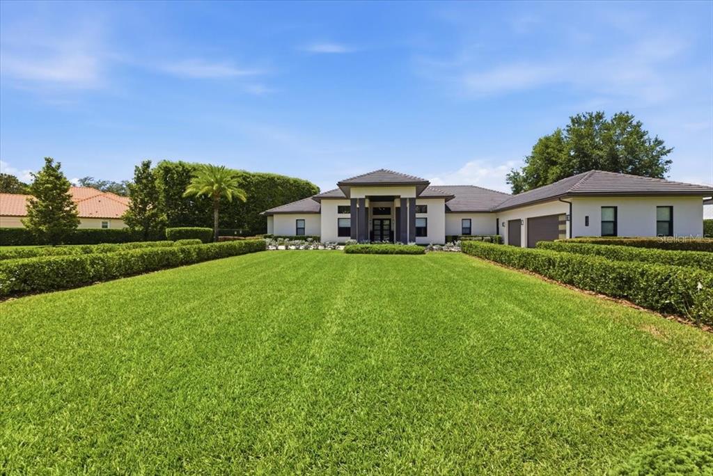 2829 Coastal Range Way Lutz, FL 33559 - Photo 10 of 64 a view of a house with a big yard