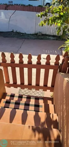 a view of a fireplace with wooden floor