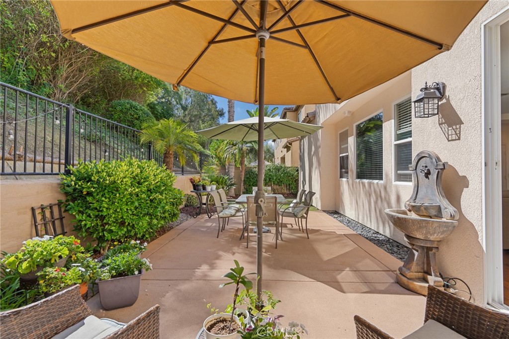 3073 Via Maximo Carlsbad, CA 92009 - Photo 7 of 21 Back patio backyard with water fountain