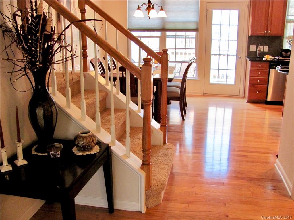 1068 Drayton Court, Unit 100 Fort Mill, SC 29708 - Photo 7 of 15 a view of entryway and hall with wooden floor