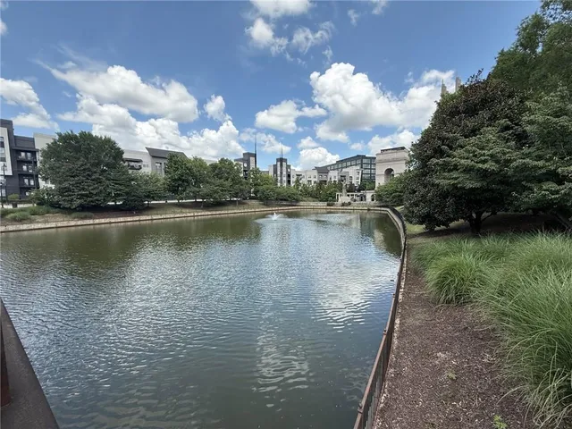 a view of a building with potted plants