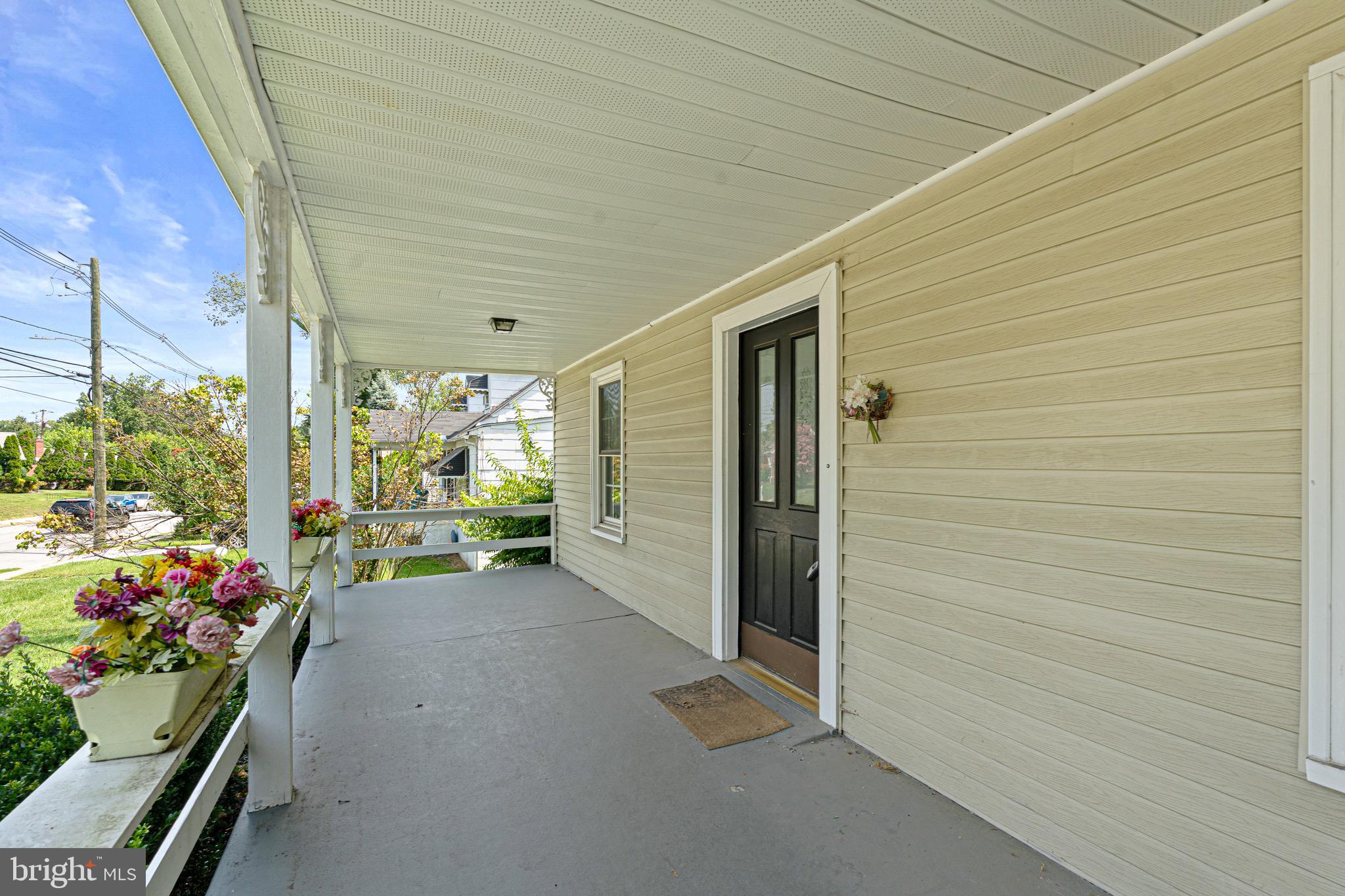 2605 Taney Road Baltimore, MD 21209 - Photo 3 of 35 a view of a porch with seating space