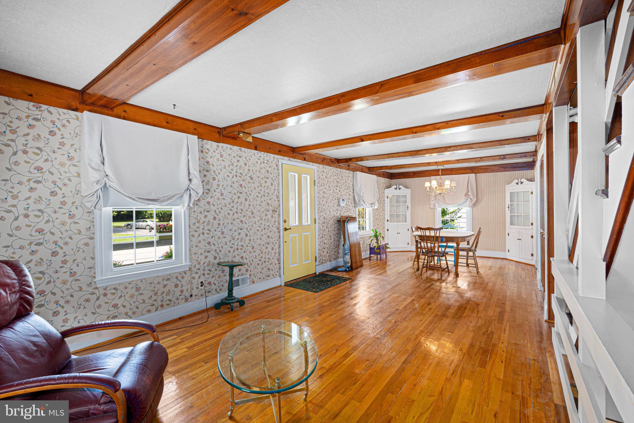 2605 Taney Road Baltimore, MD 21209 - Photo 6 of 35 a room with furniture and wooden floor