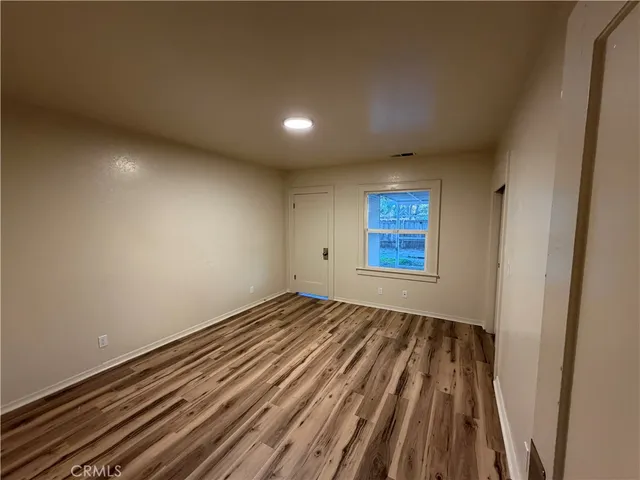 a view of an empty room and window