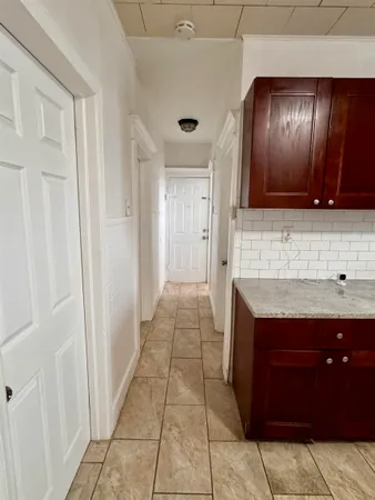 a view of a hallway with entryway