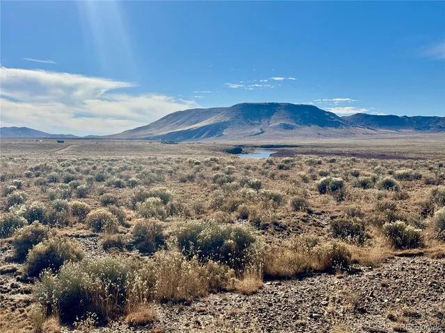 a view of a road with an ocean view