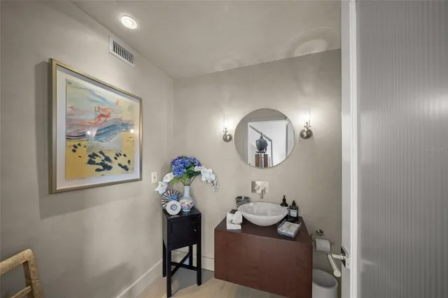 a large kitchen with stainless steel appliances lots of counter top space