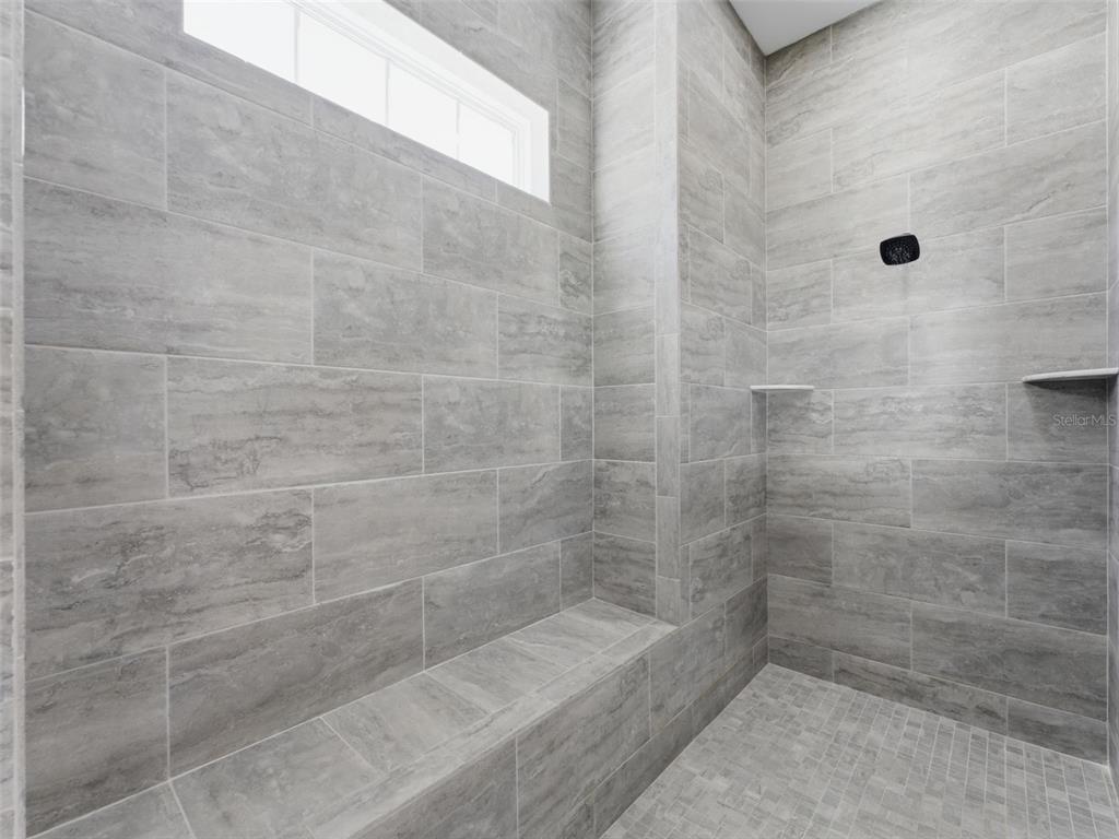 4025 Spring Park Way Brooksville, FL 34604 - Photo 44 of 97 a bathroom with a shower