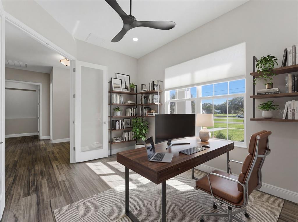 4025 Spring Park Way Brooksville, FL 34604 - Photo 46 of 97 a view of a workspace with furniture and a window