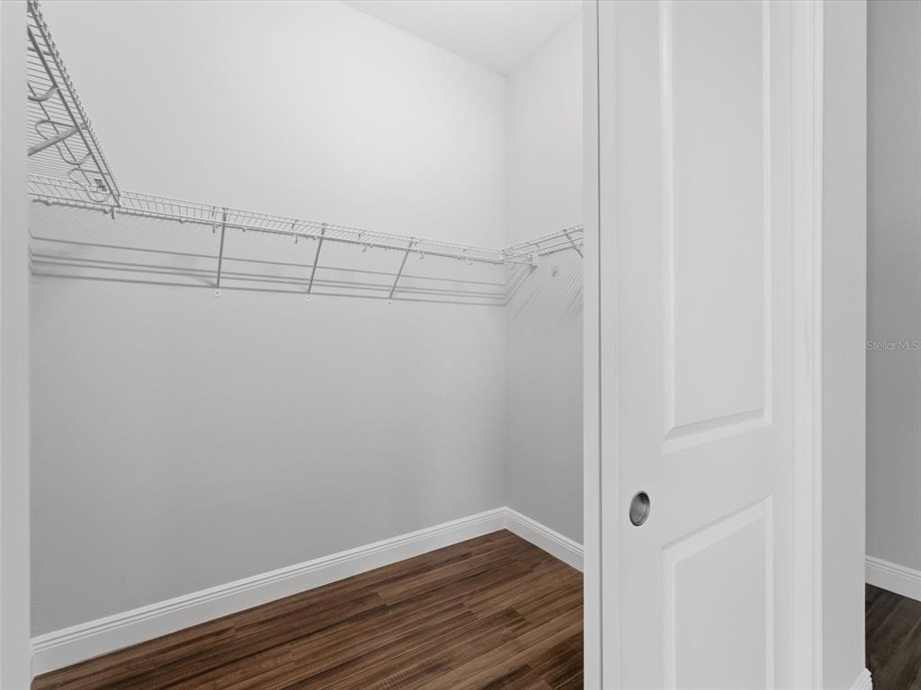 4025 Spring Park Way Brooksville, FL 34604 - Photo 65 of 97 a view of a room with racks on the wall