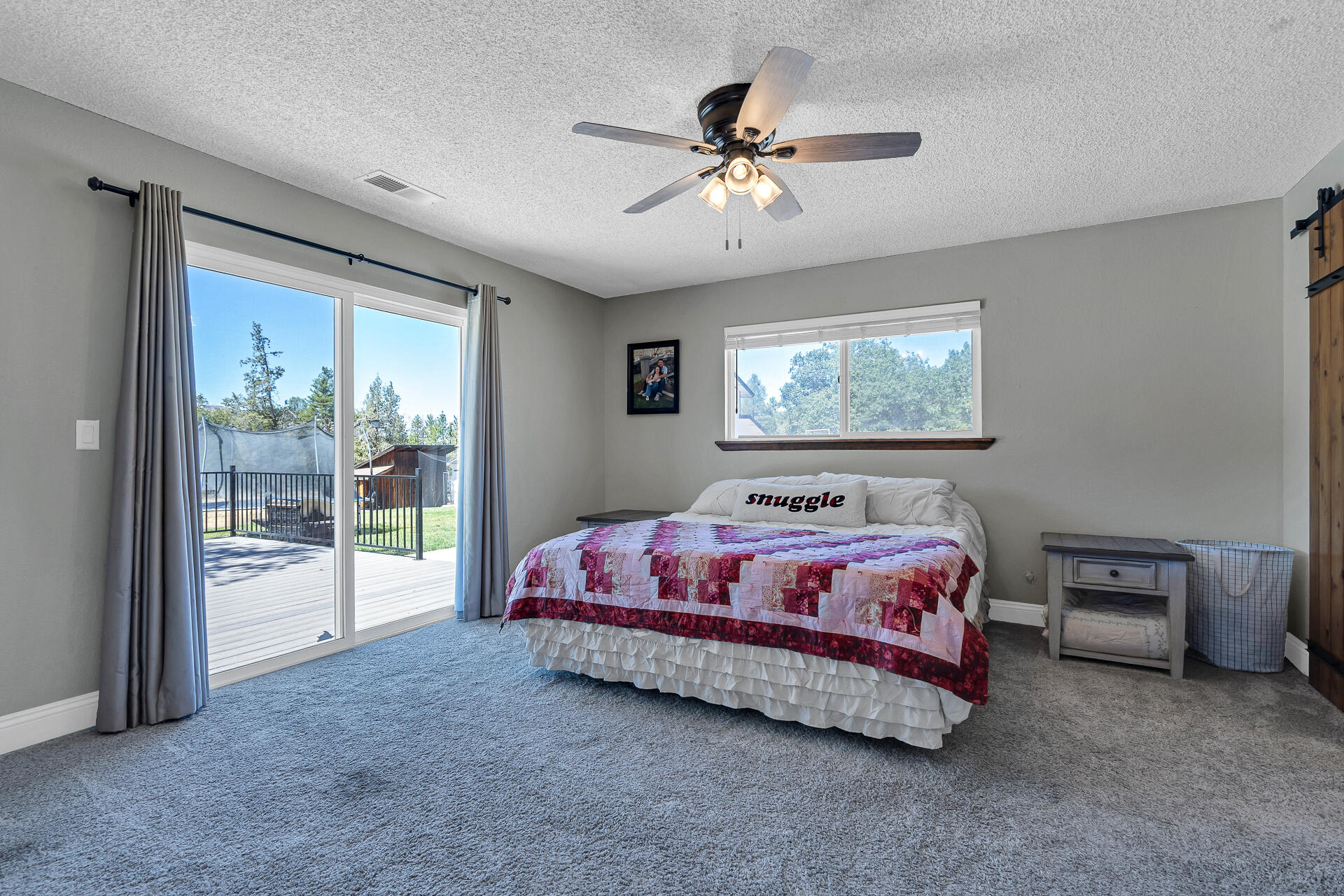 23570 Cassel Fall River Road Fall River Mills, CA 96028 - Photo 29 of 73 a bedroom with a bed and window