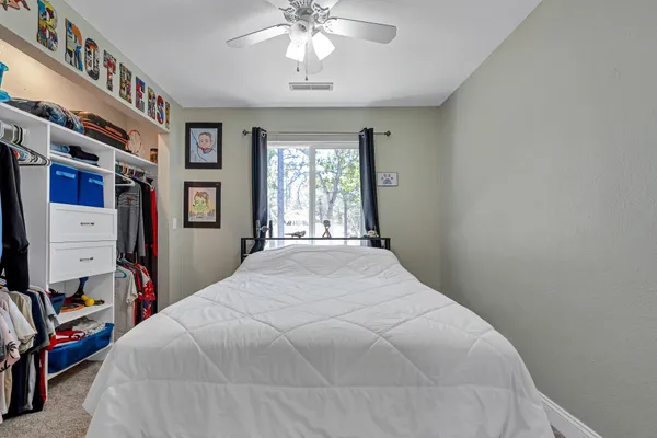 a view of a patio with a table chairs and a table