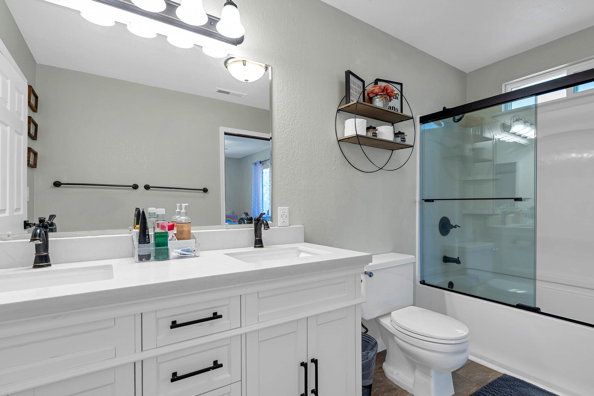 23570 Cassel Fall River Road Fall River Mills, CA 96028 - Photo 39 of 73 a bathroom with a sink a toilet and shower