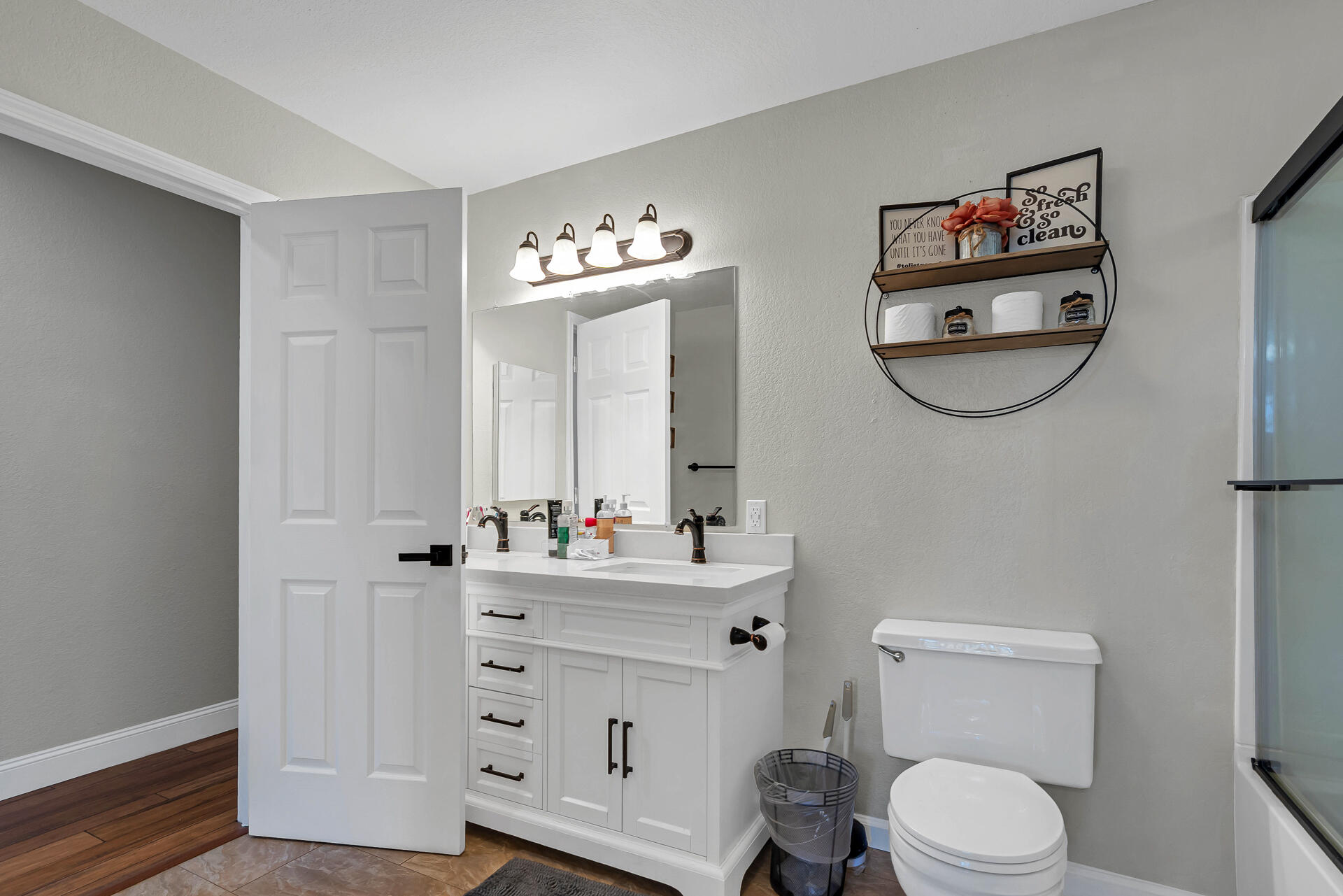 23570 Cassel Fall River Road Fall River Mills, CA 96028 - Photo 40 of 73 a bathroom with a toilet a sink and a mirror