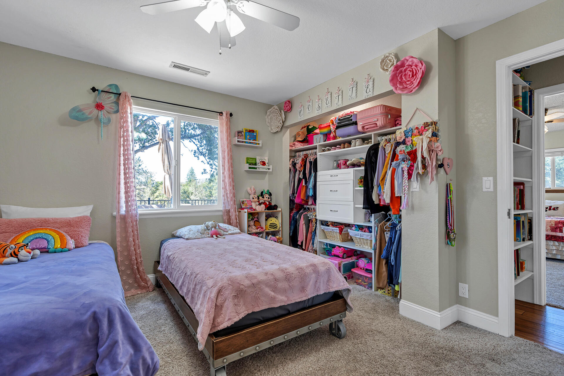 23570 Cassel Fall River Road Fall River Mills, CA 96028 - Photo 43 of 73 a bed room with a bed and a walk in closet