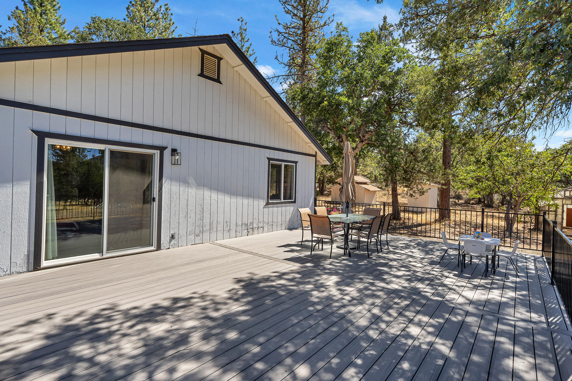 23570 Cassel Fall River Road Fall River Mills, CA 96028 - Photo 47 of 73 a backyard of a house with table and chairs