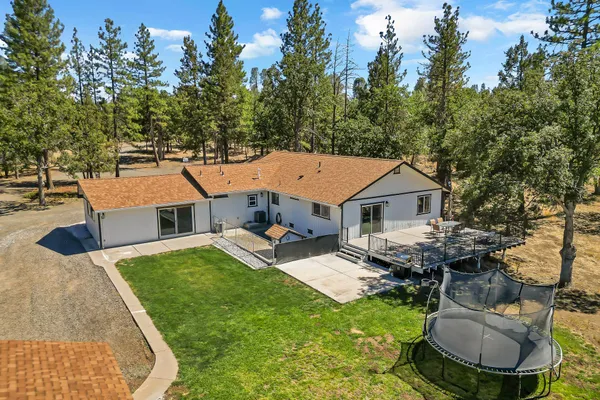 a view of a house with a park