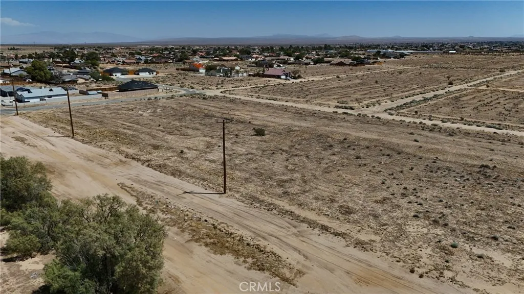 742 71st Street Edwards, CA 93523 - Photo 7 of 8 Red boundary lines on pictures are an estimate and for marketing purposes only. Buyer to verify all aspects of this property including, but not limited to utilities, assessments, boundaries, usage, access, and zoning to satisfy themselves.