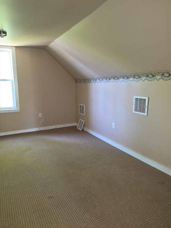 44-th 19th Street, Unit REAR Lowell, MA 01850 - Photo 3 of 13 an empty room with a windows